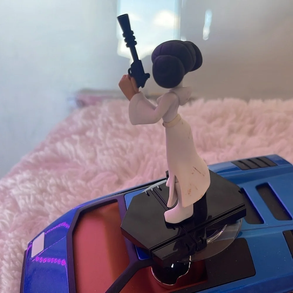 Princess Figure on Blue Toy Car